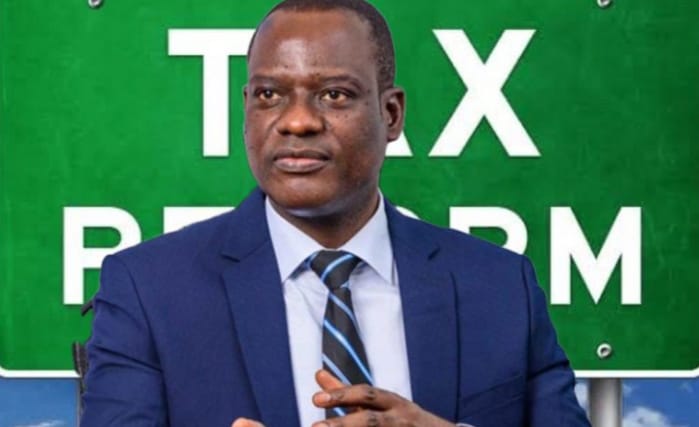 Taiwo Oyedele discussing tax reform in the Ministry’s archive photograph